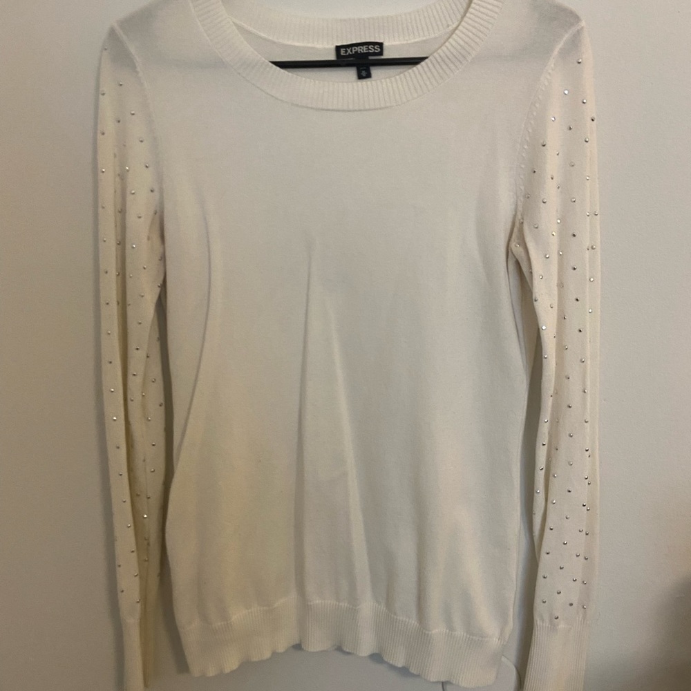 Women’s Express cream colored sweater with gems size M